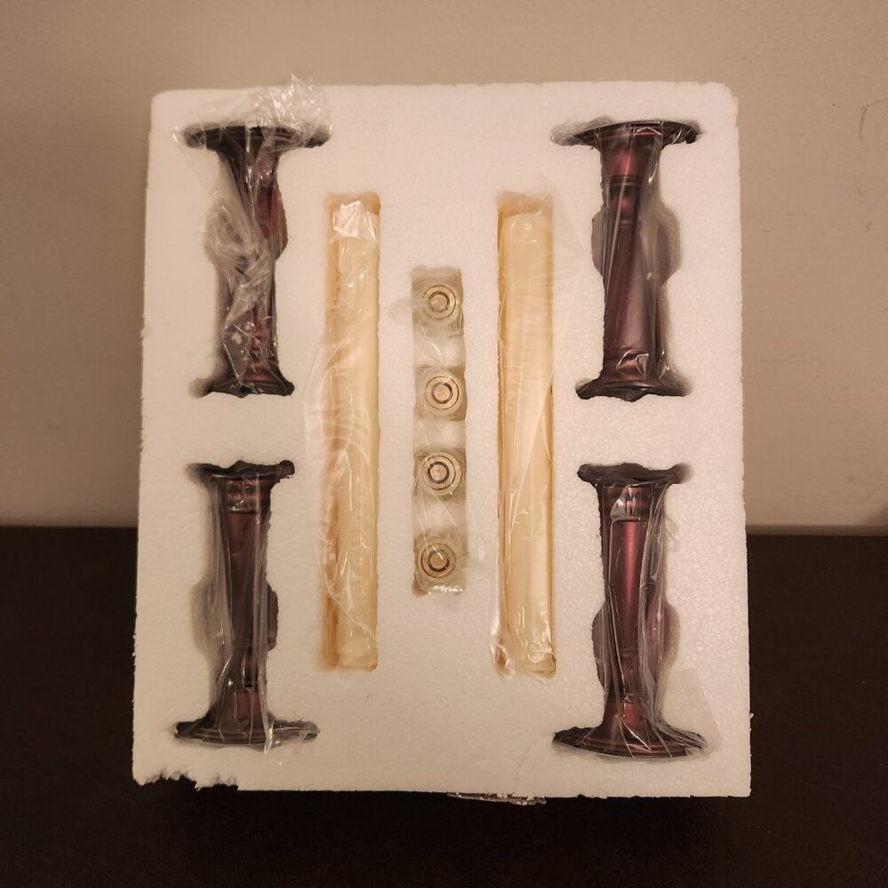 Set of 4 adjustable battery-operated candles is a modern and stylish addition to